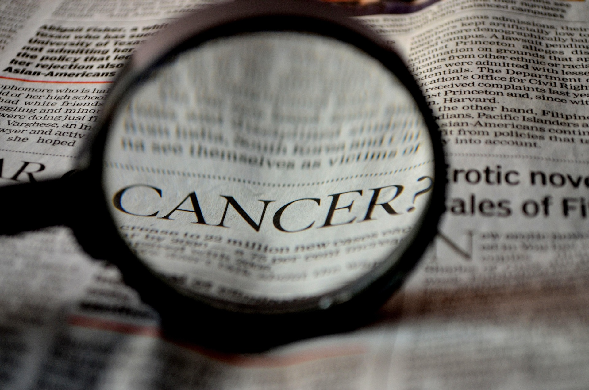 Magnifying glass looking over medical claim
